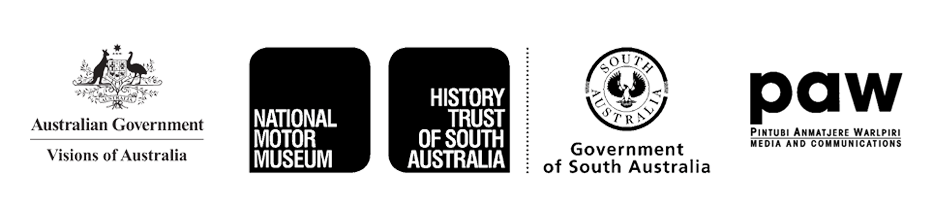 Four black and white logos representing the Australian Government Visions of Australia branch, the National Motor Museum and History Trust of South Australia, the Government of South Australia and Pintubi Anmatjere Warlpiri Media and Communications 
