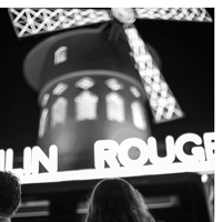 a shot of the famous windmill of the Paris Moulin Rouge show