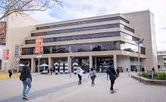 The image shows the State Library of WA building