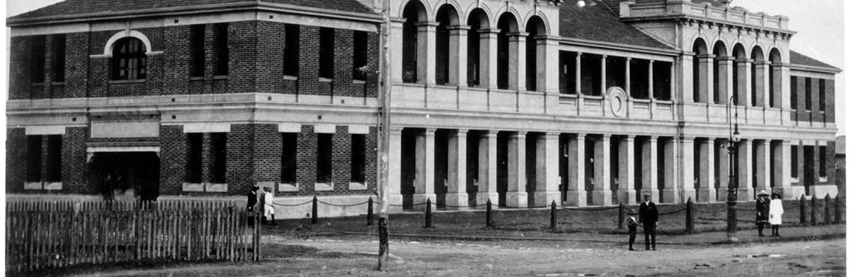 Black and white photo of a large building
