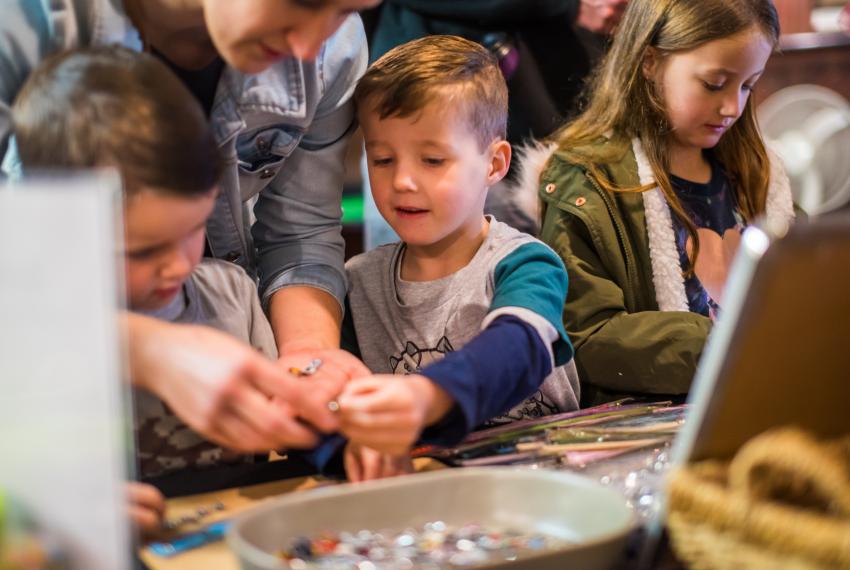 Children play together at an activity