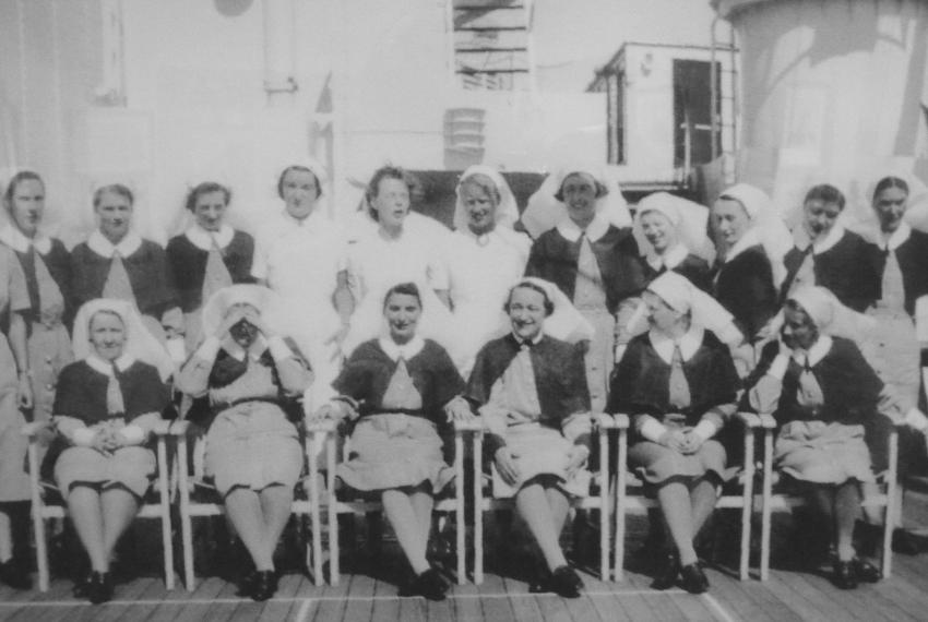 A black and white group photograph from the 1940s of nurses in uniform