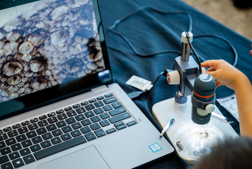 A laptop and microcope