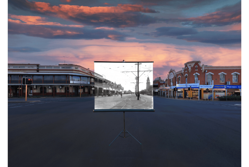 Black and white photo on a canvas in the centre of a larger modern colour photo. The location is a perfect match.