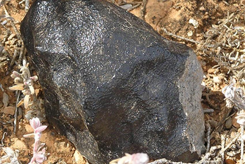 One large piece of a meteorite on the ground