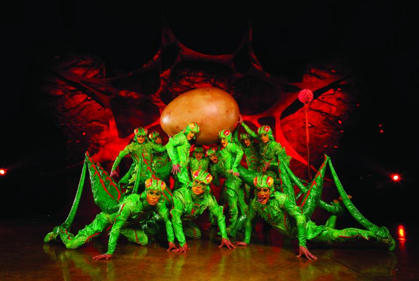 Circus performers dressed as crickets