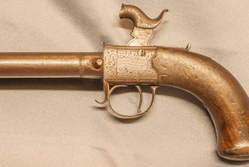 An ornate 19th century pistol