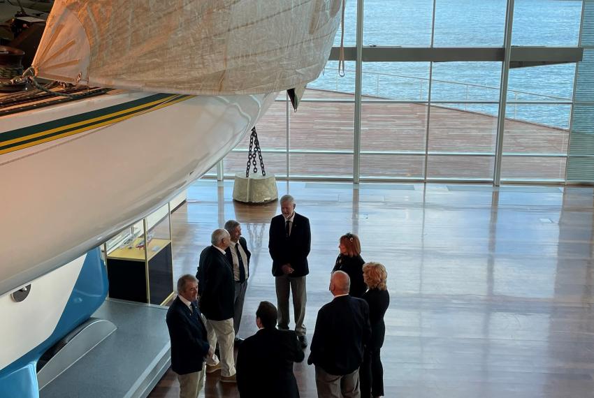Eileen Bond and crew members take a sneak peek during filming for the new Australia II: 40 Years On exhibition film.