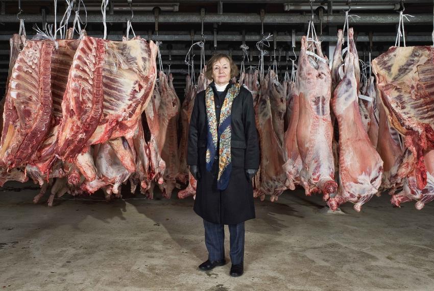 A convict descendant poses alongside items similar to those stolen by convict ancestors