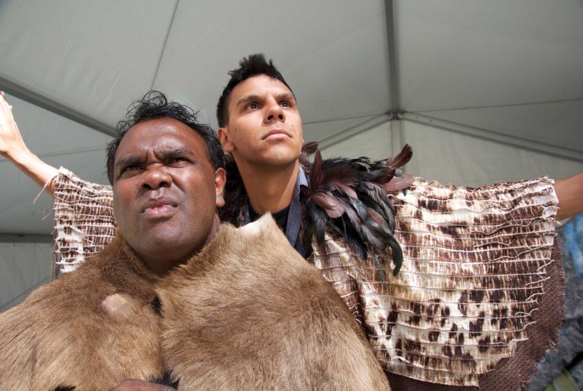 Two performers from Yirra Yaakin posing for a photo