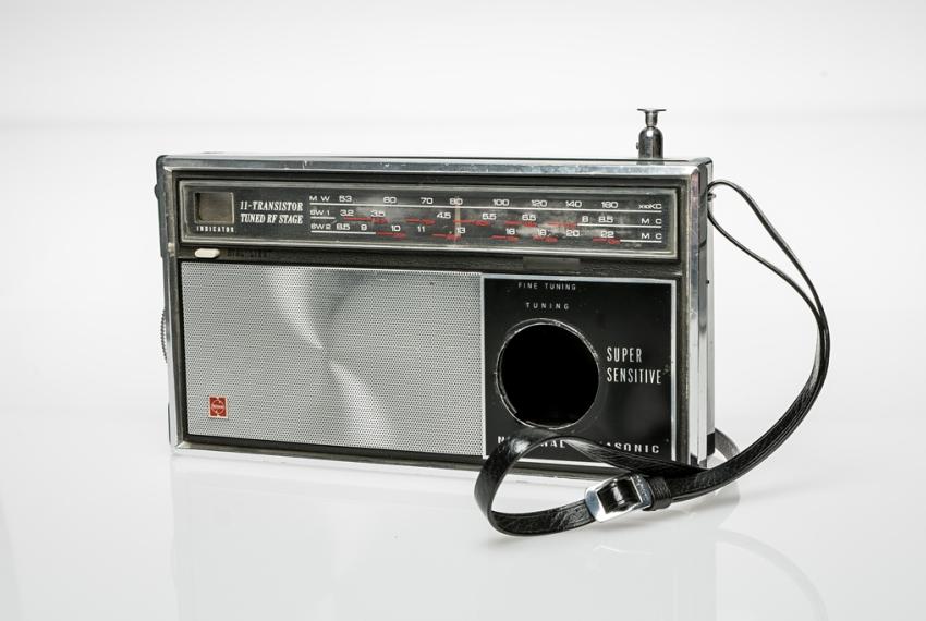 A silver and black radio adapted to conceal a camera, c1965.