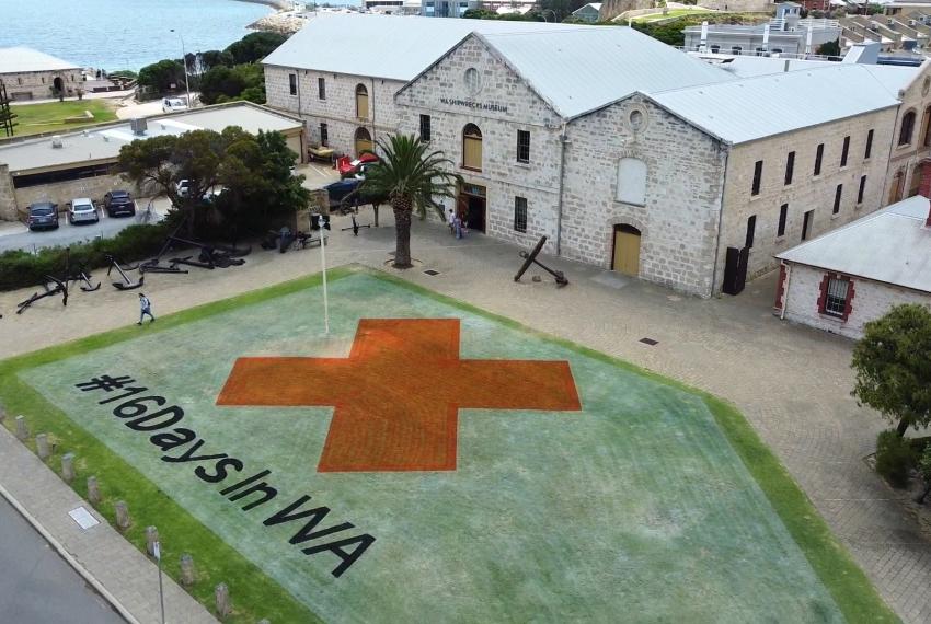 16 Days in WA campaign emblem painted on the WA Shipwrecks Museum's lawn