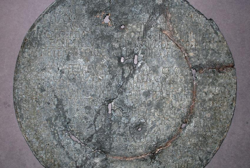 pewter plate marked with inscriptions
