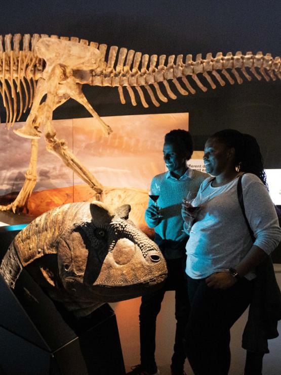 Image of to patrons exploring the Dinosaurs of Patagonia exhibition 