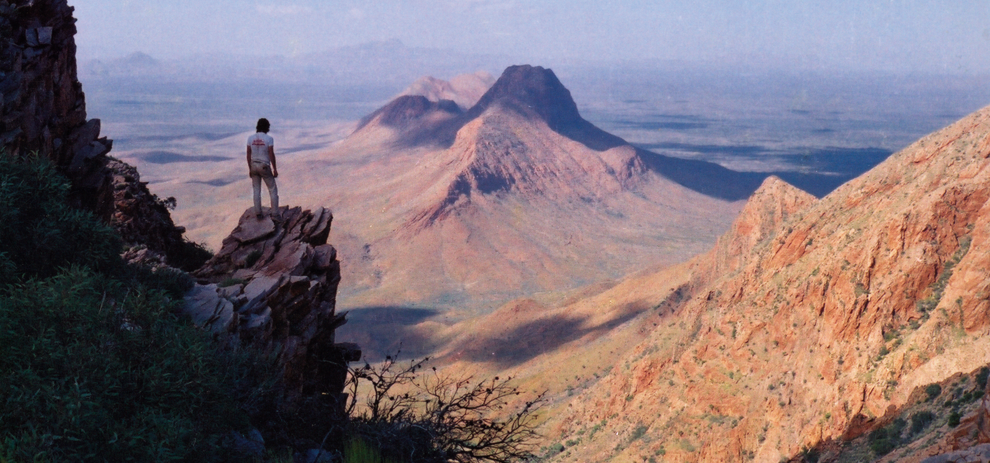 A person looking over a vast landscape