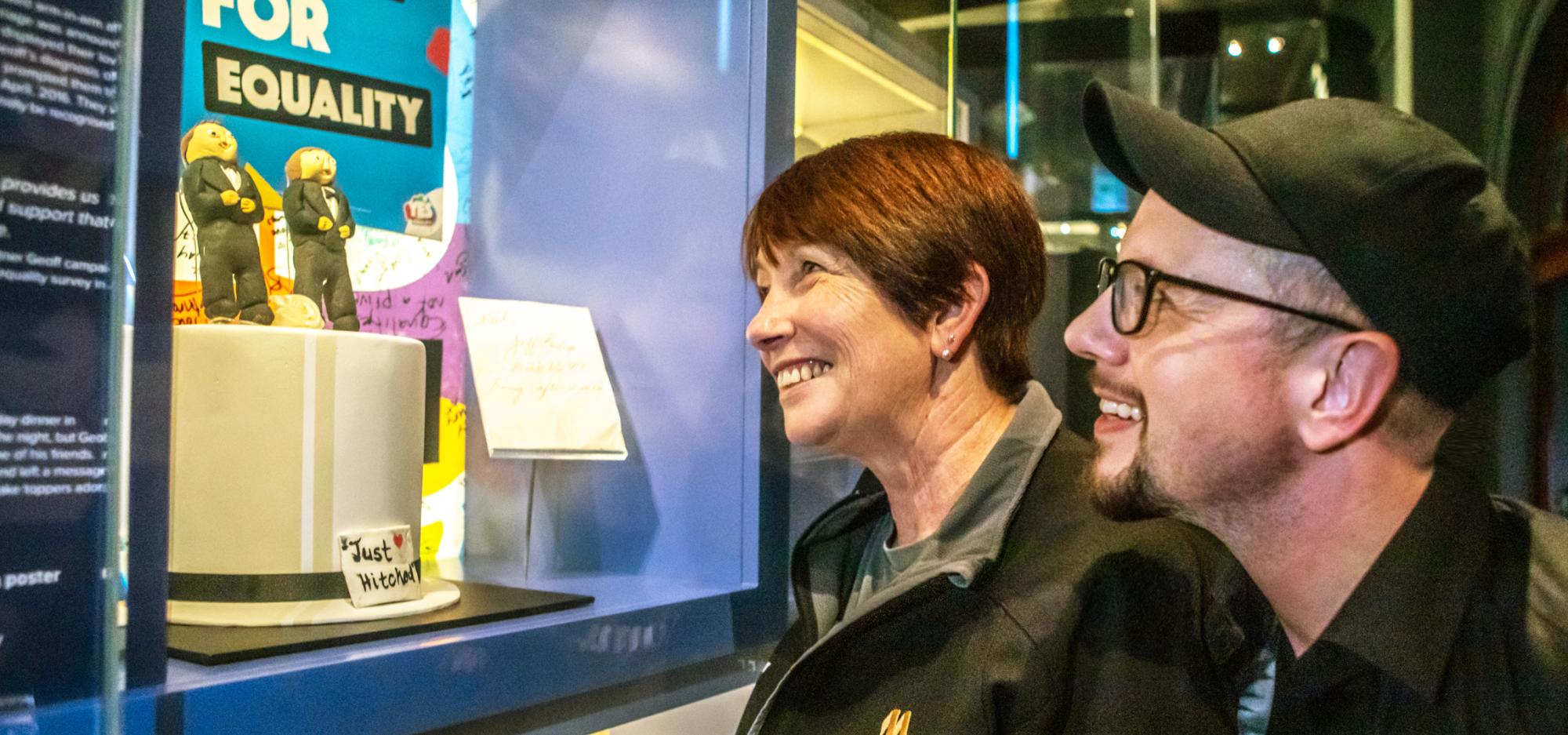 2 people looking at a Museum display