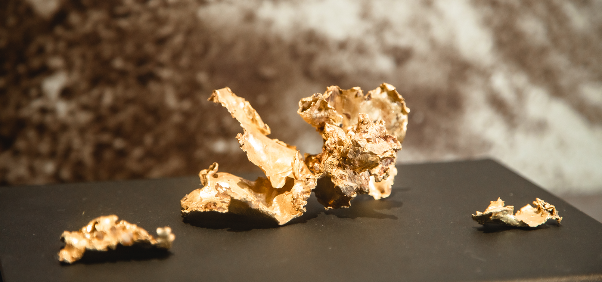 A close up image of natural gold nuggets