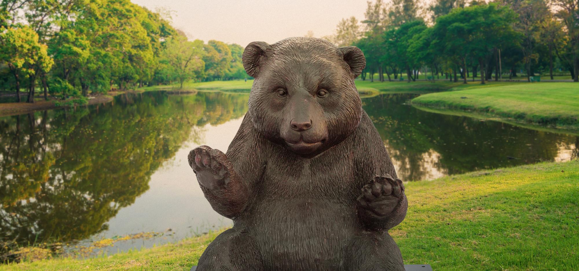 Wild Baby Panda statue on a grassy knoll