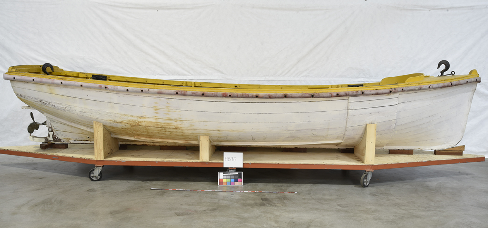 Heavily constructed open motor workboat used for servicing navigational beacons, buoys and lighthouses from the Commonwealth Government lighthouse tender MV Cape Don. The workboat’s hull is carvel planked in Oregon wood. It is installed with a 4-cylinder Kelvin diesel 20 horsepower engine. 