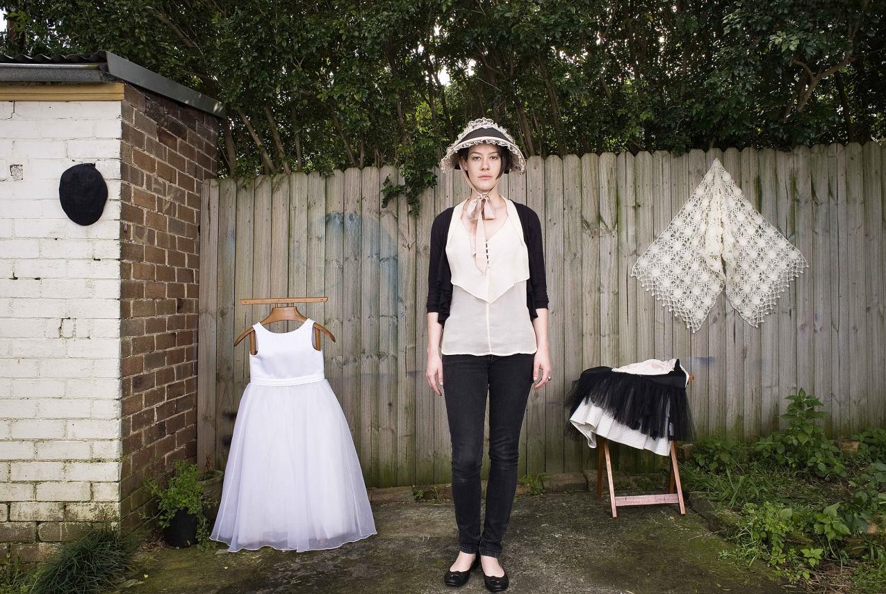 A model posing with stolen items