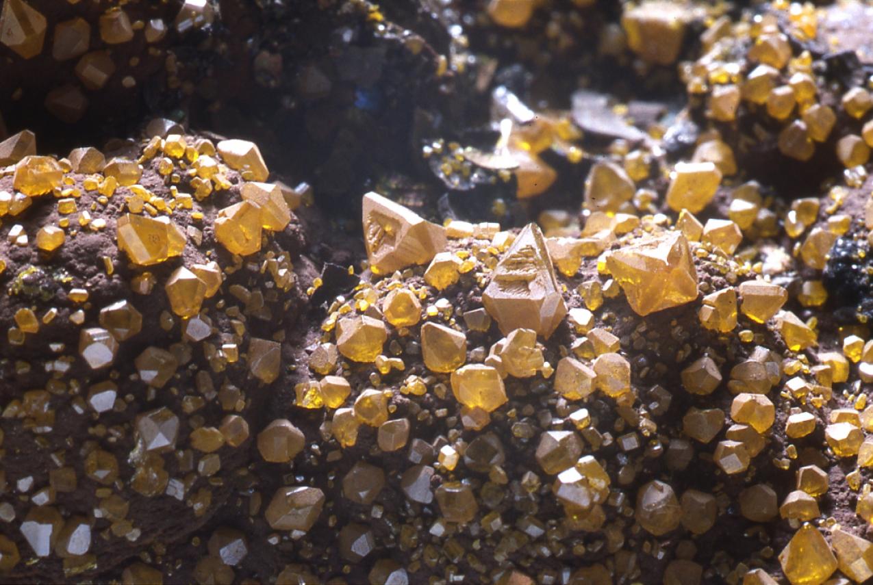 A crystal wulfenite formation on some large rocks