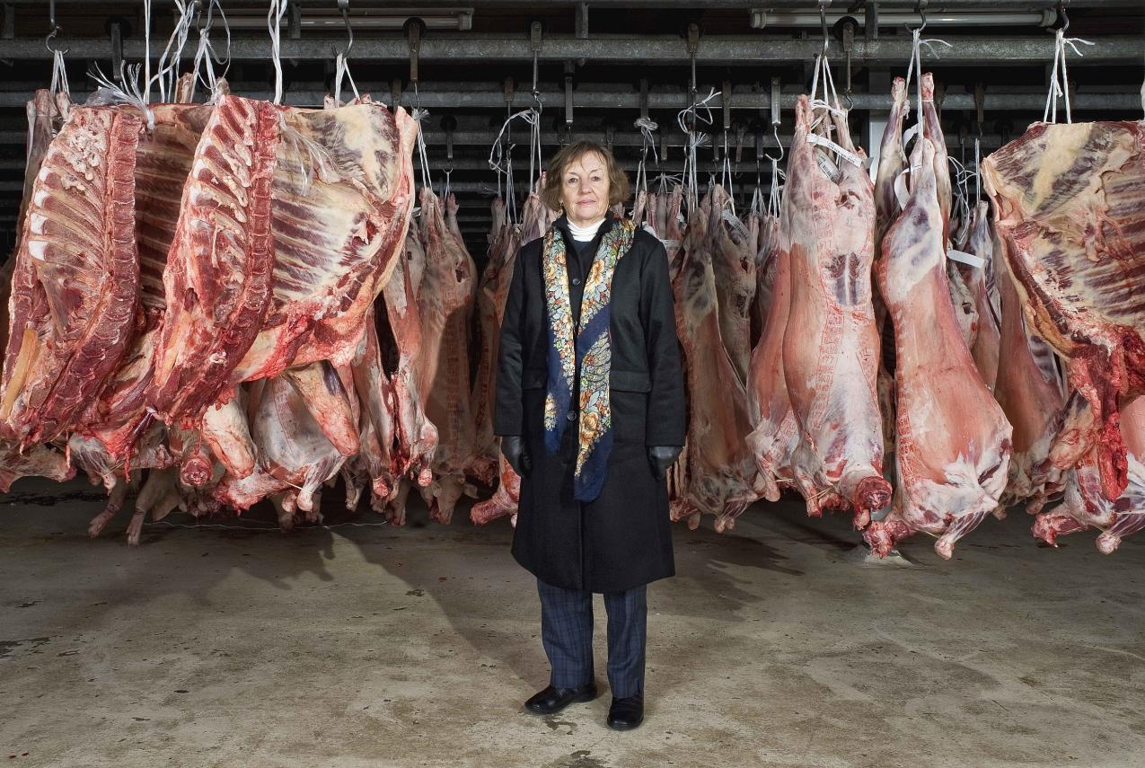A convict descendant poses alongside items similar to those stolen by convict ancestors