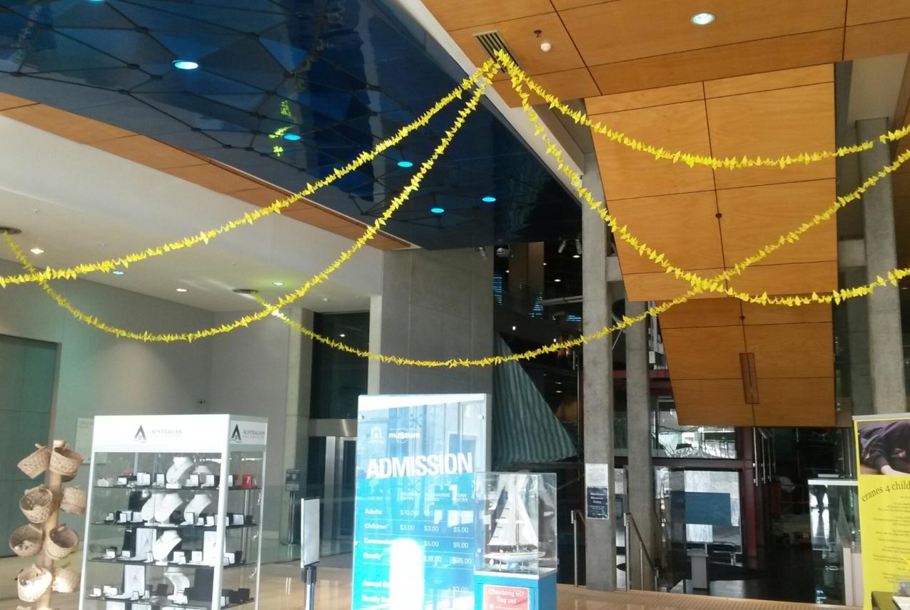 Picture of golden cranes hanging inside the WA Maritime Museum
