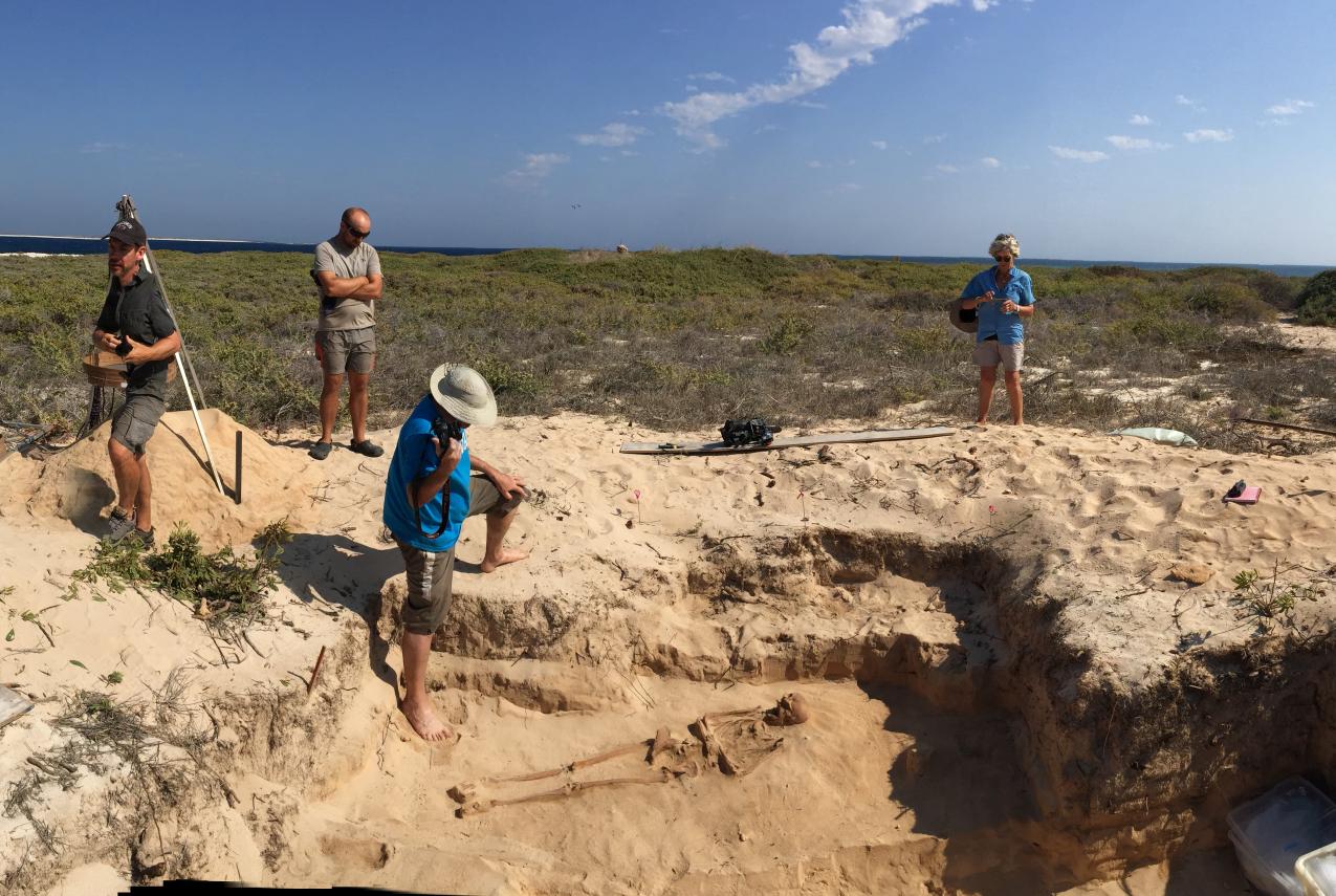 Researchers carefully excavating burial site at Beacon Island