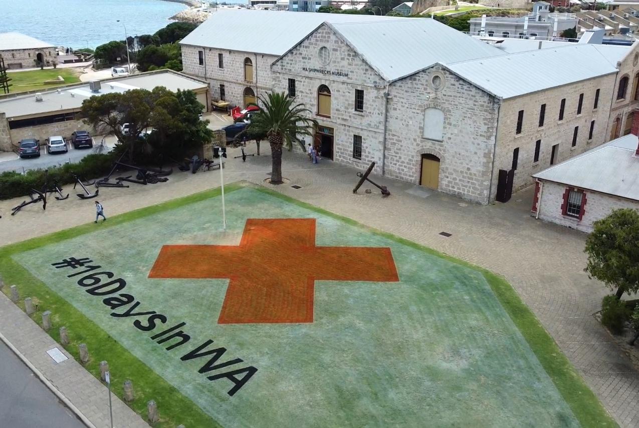 16 Days in WA campaign emblem painted on the WA Shipwrecks Museum's lawn