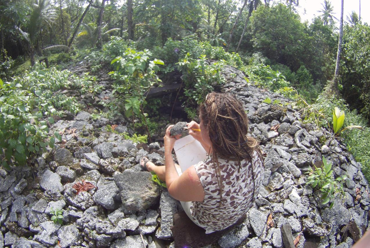 WA Museum's Dr Zoe Richards examining corals at one of the ancient Leluh tombs