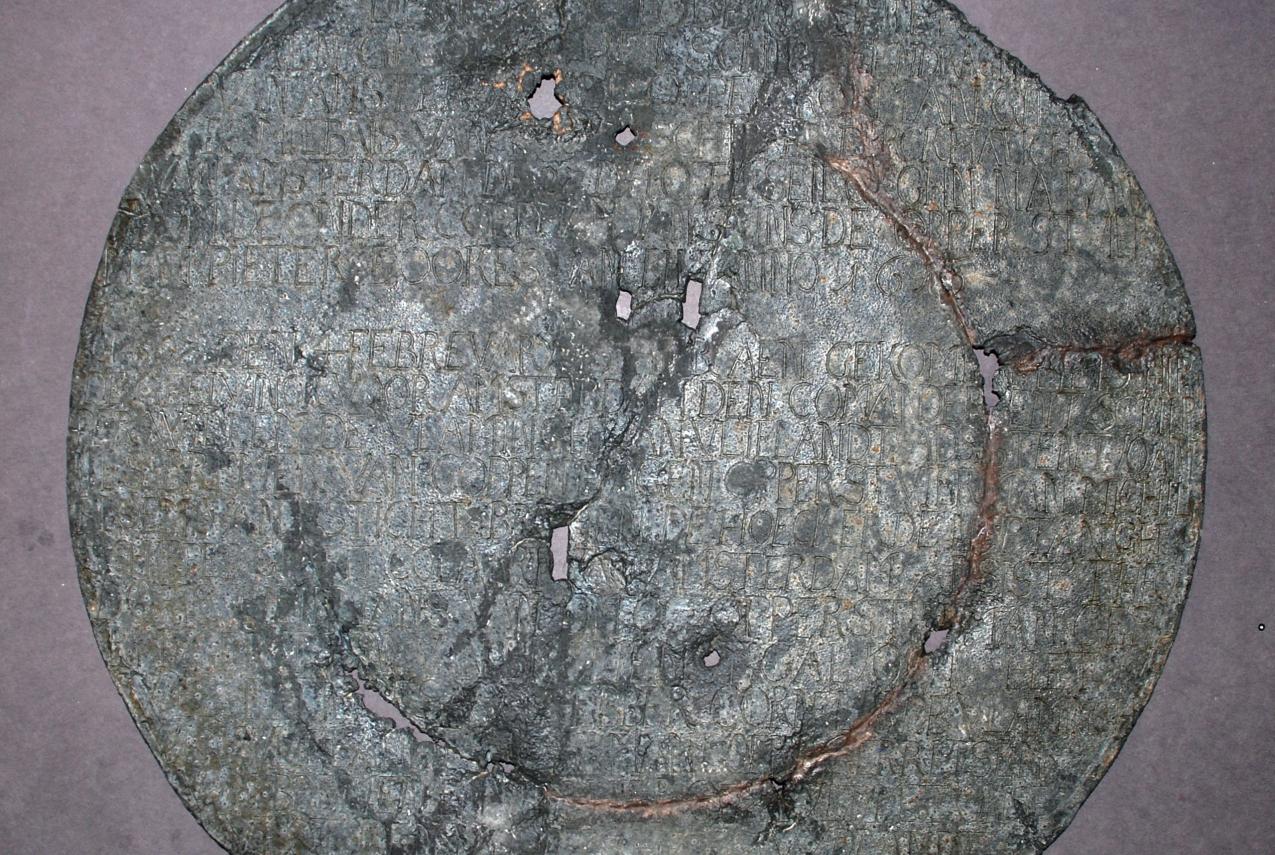 pewter plate marked with inscriptions