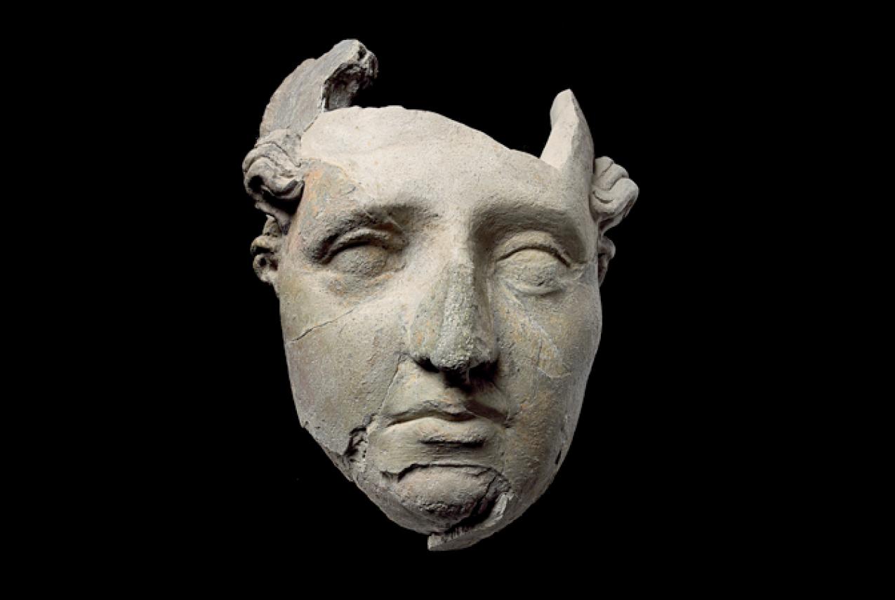 A greeco-roman style mask artefact
