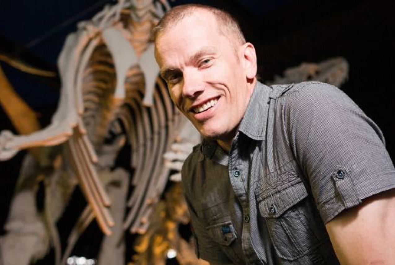 Dr Mikael Siversson with a cast of a Muttaburrasaurus at the WA Museum - Perth