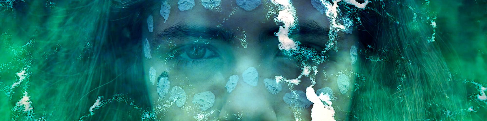 Young girl captured in a portrait, adorned with traditional face painting, layered with an aerial view of water, blending culture and nature in a single image.