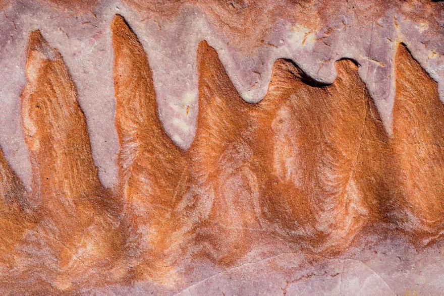 A close-up view of a red and white rocky landscape