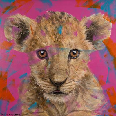 A painting of a Lion cub on an orange and pink background with visible brushstrokes in shades of light blue, orange and purple across the canvas and subject. The words Gillie and Marc are handwritten in the bottom left corner of the image. 