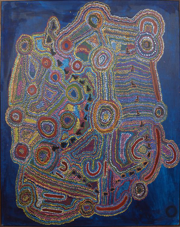 A vividly colourful Aboriginal painting representing the topography of Country with a range of colourful shapes on a blue background