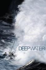 a violent crashing of a wave with some small rocks. the words Deep Water sppear on the white water 