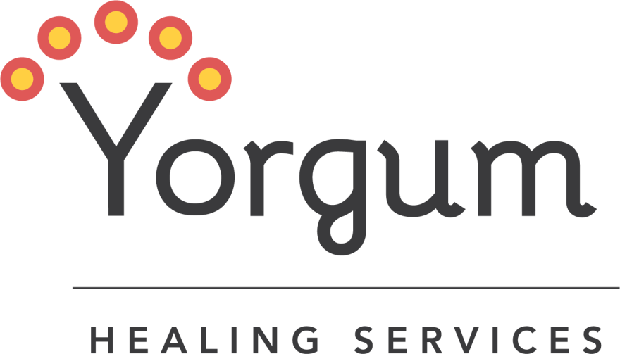 The words Yorgum Healing Services in bold black text with five red and yellow circles positioned aesthetically over the Y.