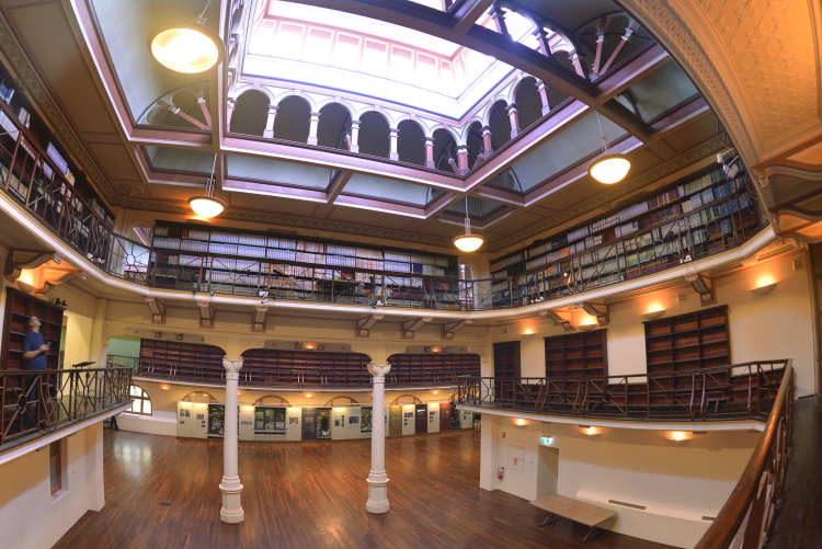 An ornate multi-level gallery space complete with balustrades, archways and columns