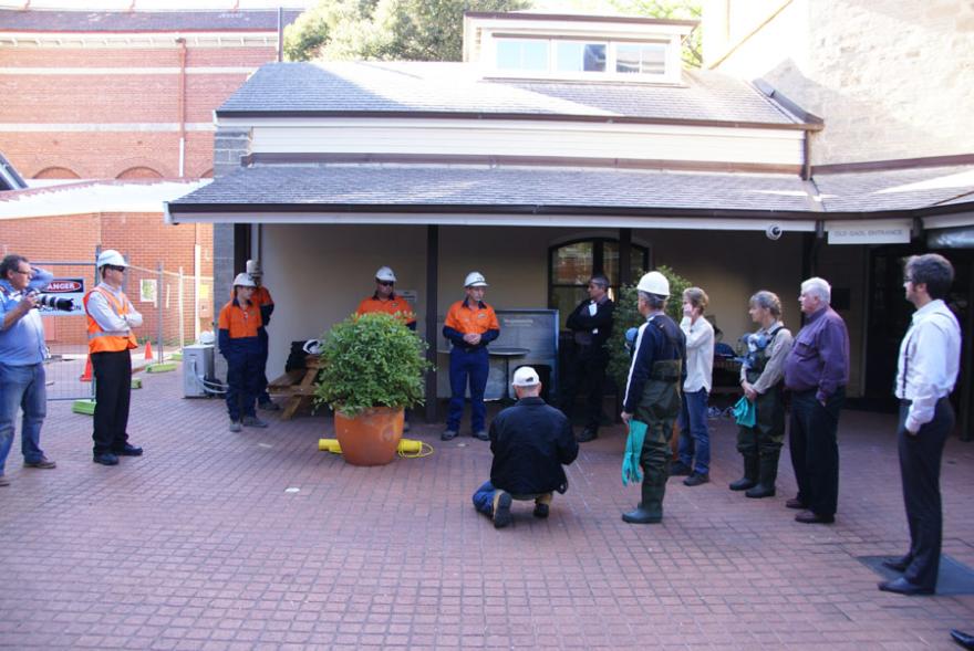A Safety briefing occurring on Museum grounds