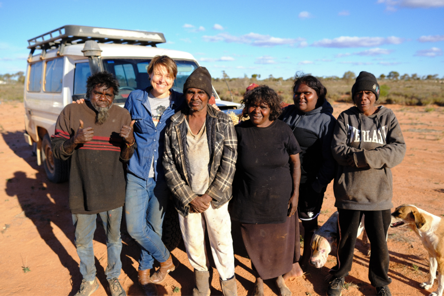 Group photo of Milpa Artists in the Australian desert