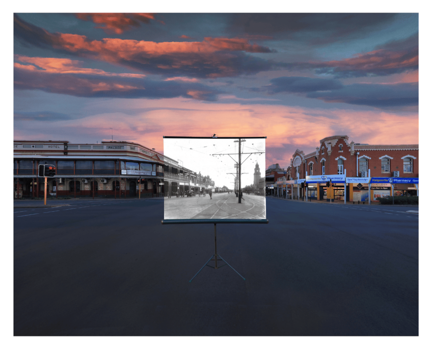Black and white photo on a canvas in the centre of a larger modern colour photo. The location is a perfect match.