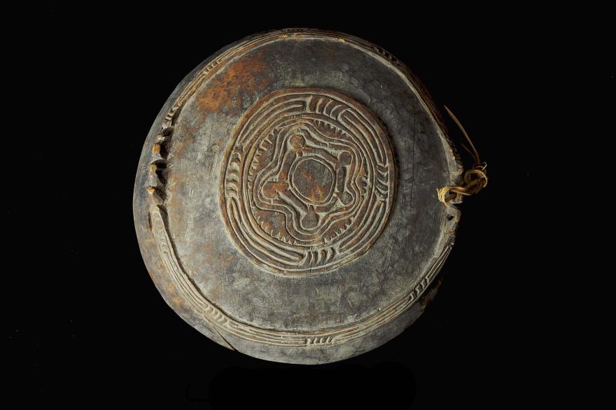 Finely carved food bowl from Murik Lakes that may be hung from a wall. Front View.
