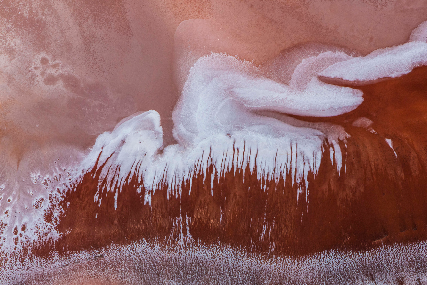 An aerial landscape photograph of a salt lake in the Western Australian Goldfields