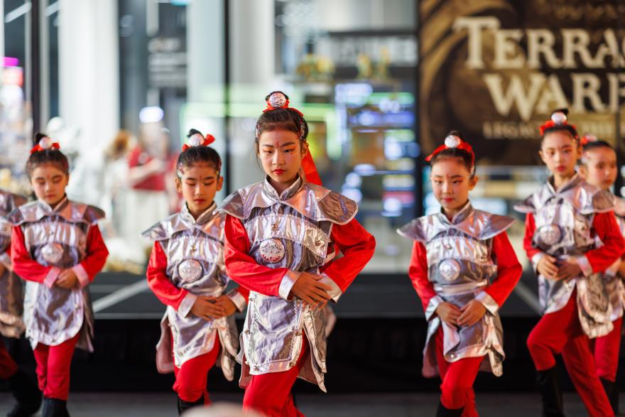 A group of young children dressed as Terracotta Warriors