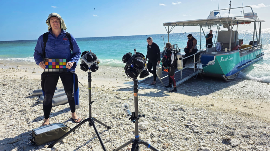 Film crew on beach 
