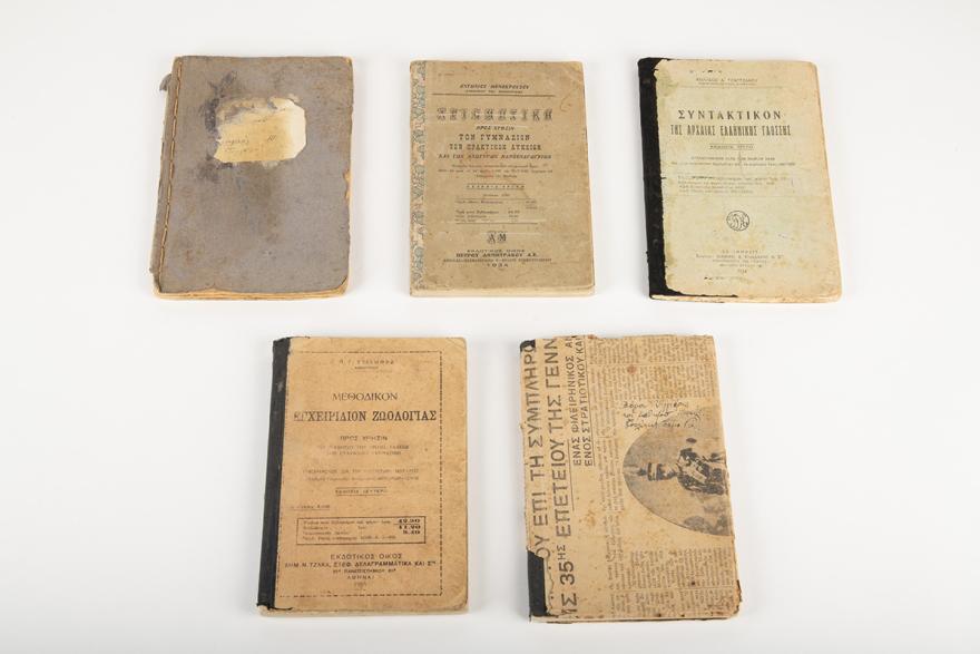 Five aged school books