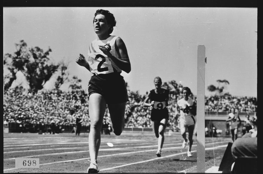 Behind her are Marise Chamberlain (in black) and England's Joy Jordan