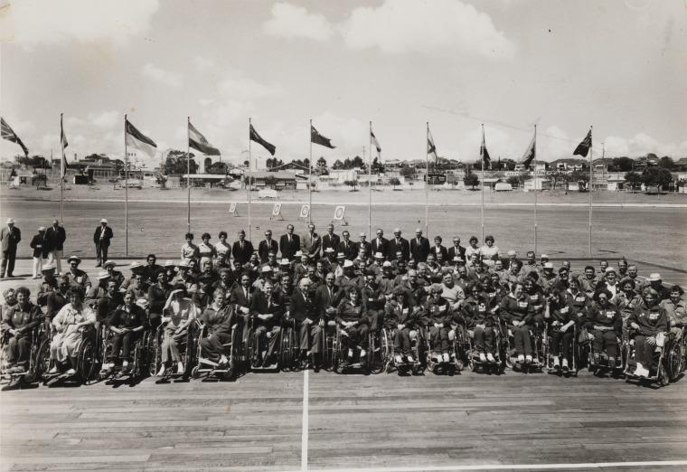 A group of para-athletes posing for a photo